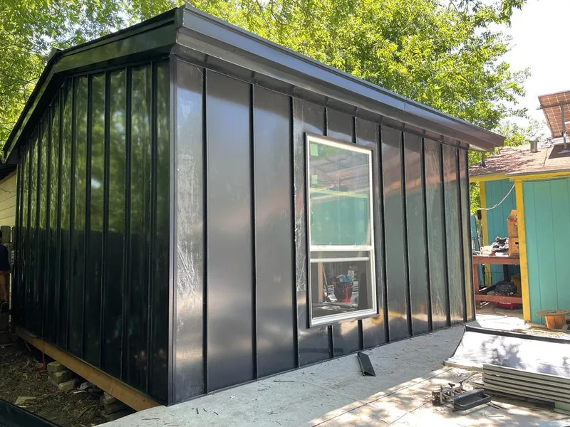 Black standing seam metal wall panels for Metal Roof Installation in New Haven